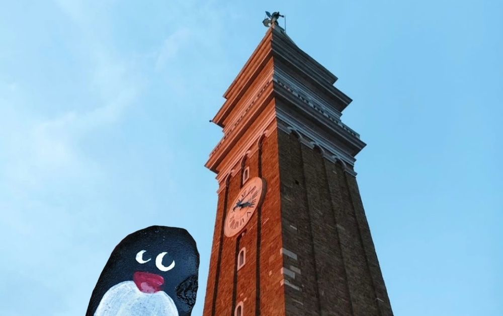 Hand-painted penguin stone #394 hidden at Clock Tower, Piran, Slovenia (photo 1 of 5)