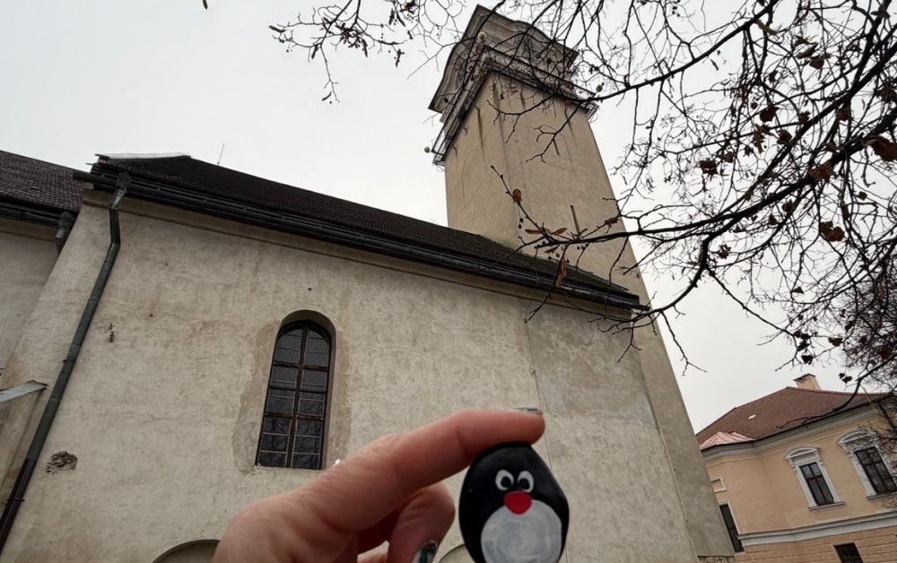 Hand-painted penguin stone #686 hidden at St. Egidia Church, Poprad, Slovakia (photo 1 of 5)