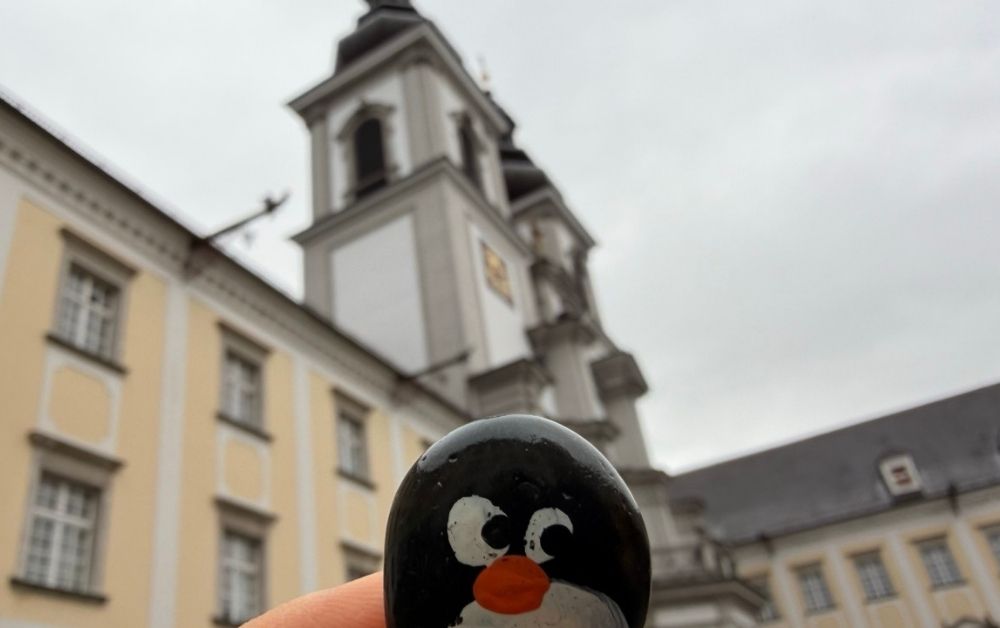 Hand-painted penguin stone #803 hidden at Kremsmunster Abbey, Kremsmunster, Austria (photo 1 of 5)
