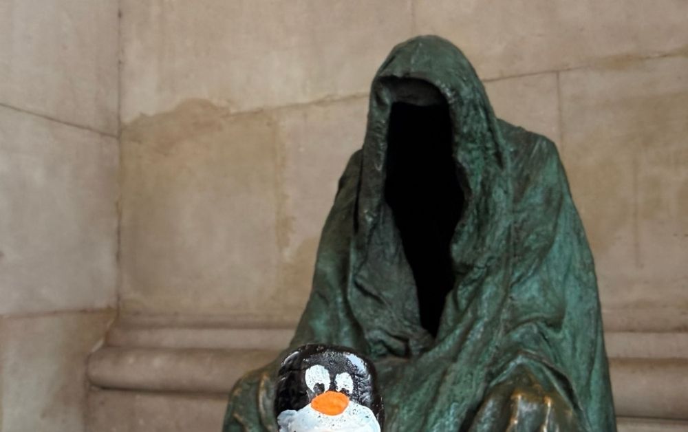 Hand-painted penguin stone #808 hidden at Pieta by Anna Chromy, Salzburg, Austria (photo 1 of 5)