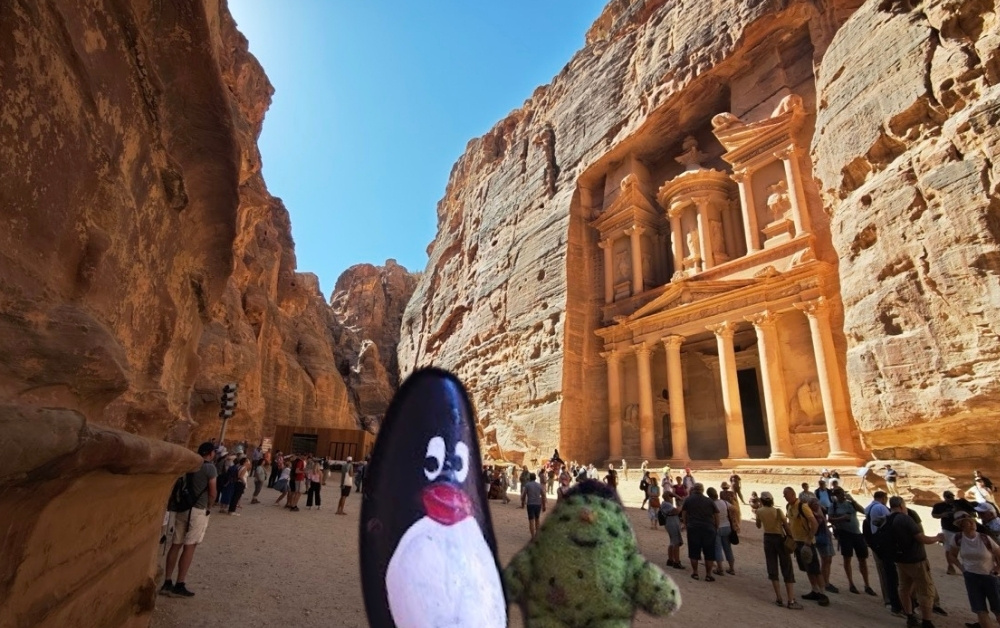 Hand-painted penguin stone #571 hidden at The Treasury, Petra, Jordan (photo 1 of 5)