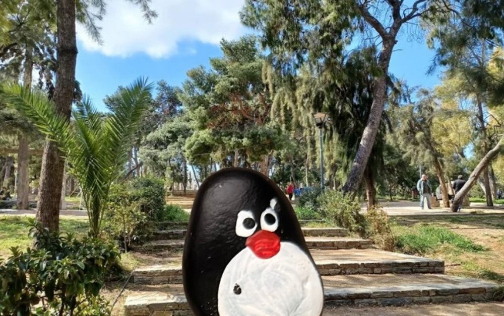 Hand-painted penguin stone #958 hidden at Alsos of Nea Smyrni, Athens, Greece (photo 1 of 5)