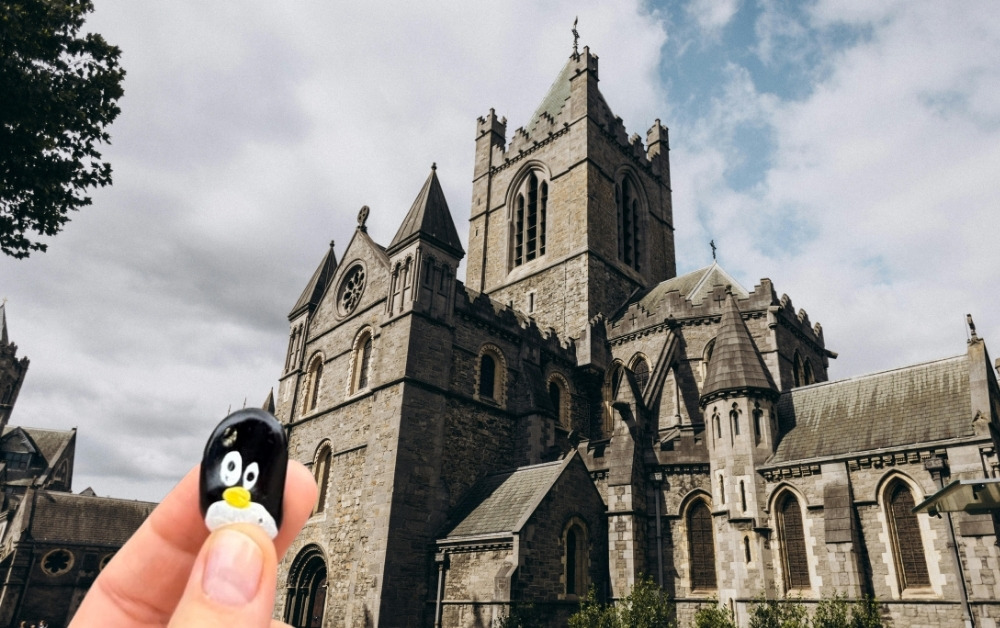 Hand-painted penguin stone #1025 hidden at Christ Church Cathedral, Dublin, Ireland (photo 1 of 5)