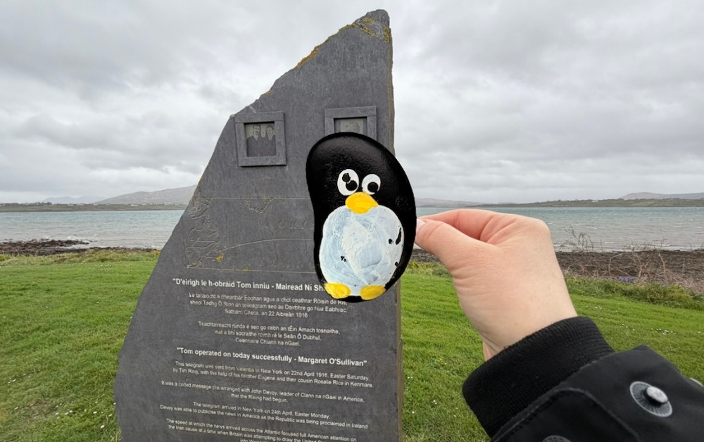 Hand-painted penguin stone #1079 hidden at Eighth Wonder - Transatlantic Cable Station, Valentia, Ireland (photo 1 of 5)