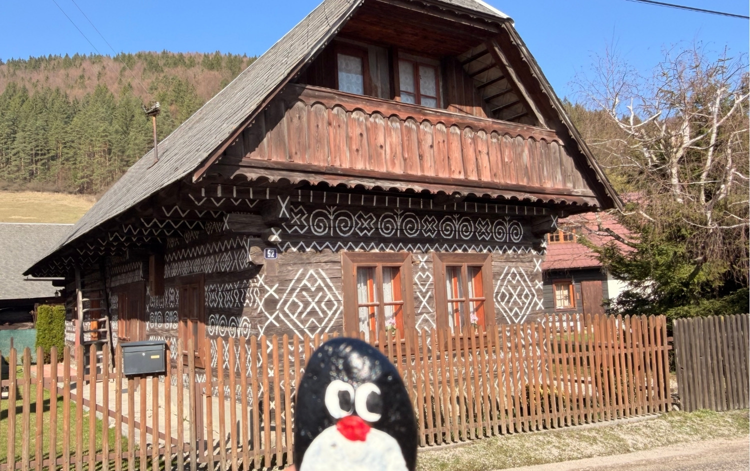 Hand-painted penguin stone #900 hidden at Radenov Dom, Cicmany, Slovakia (photo 1 of 5)