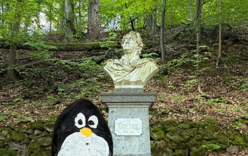 Hand-painted penguin stone #1061 hidden at Bust of Johann Wolfgang von Goethe, Karlove Vary, Czechia (photo 1 of 5)