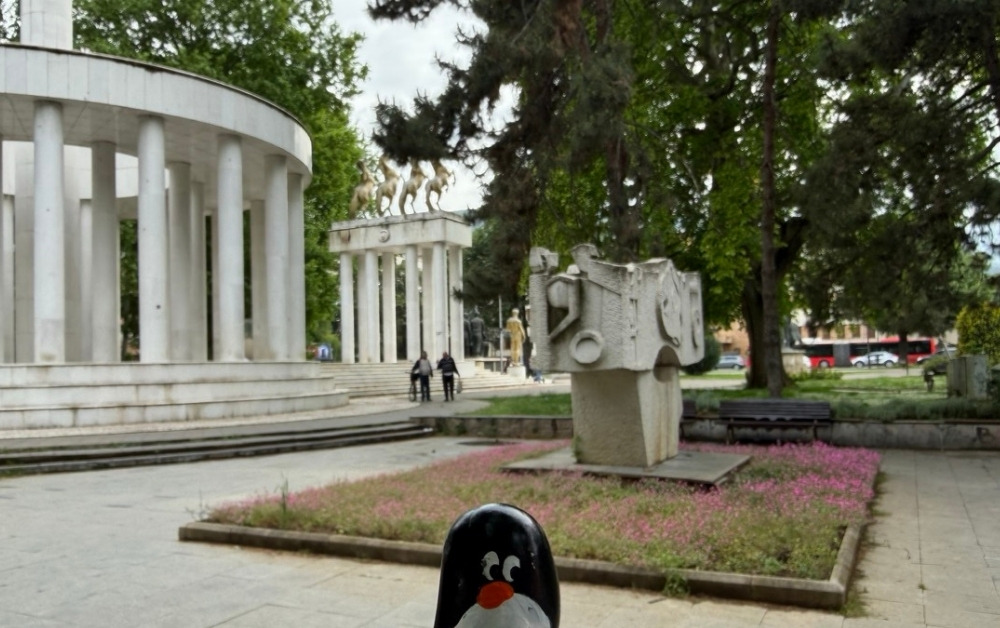 Hand-painted penguin stone #1150 hidden at Monument to the Founders of IMRO 1893, Skopje, North Macedonia (photo 1 of 5)