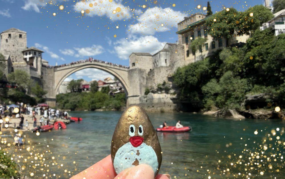 Hand-painted penguin stone #512 hidden at Mostar Old Bridge Photopoint, Mostar, Bosnia and Herzegovina (photo 1 of 5)