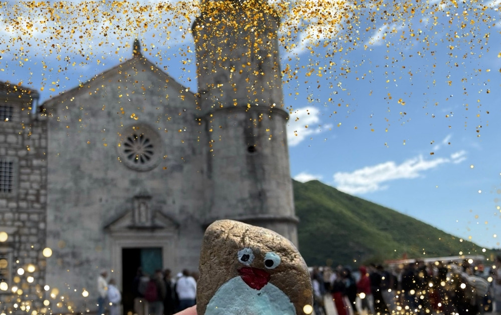 Hand-painted penguin stone #518 hidden at Church of Our Lady of the Rocks, Perast, Montenegro (photo 1 of 5)