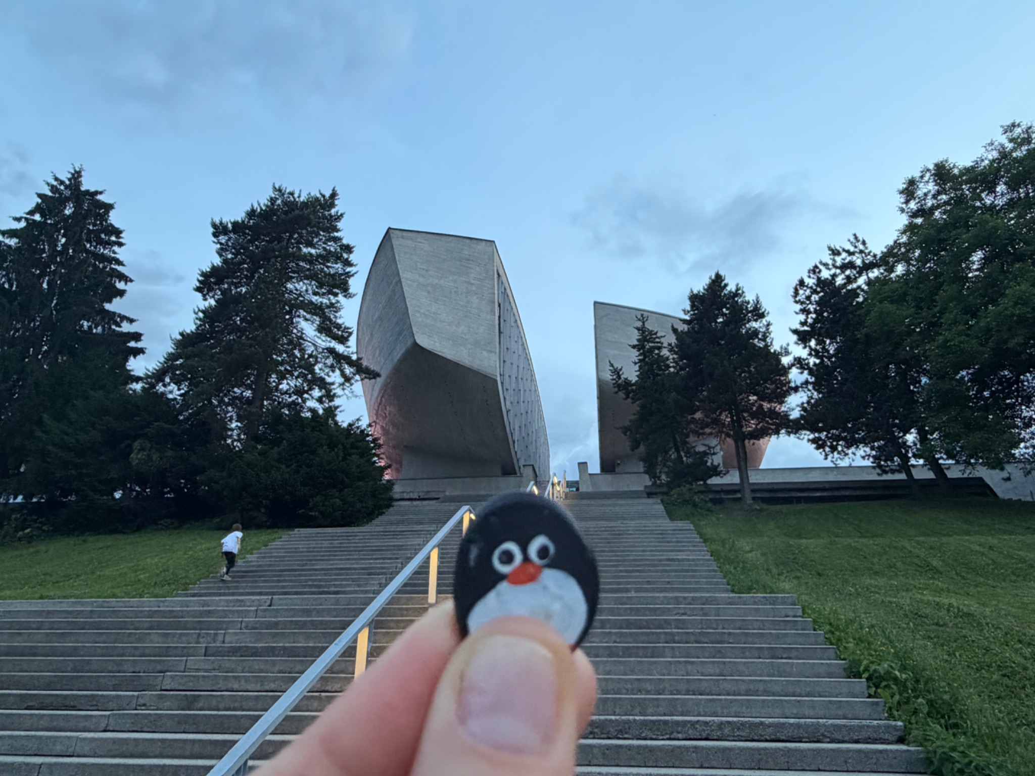 Hand-painted penguin stone #1169 hidden at Park under the SNP Museum, Banska Bystrica, Slovakia (photo 1 of 4)