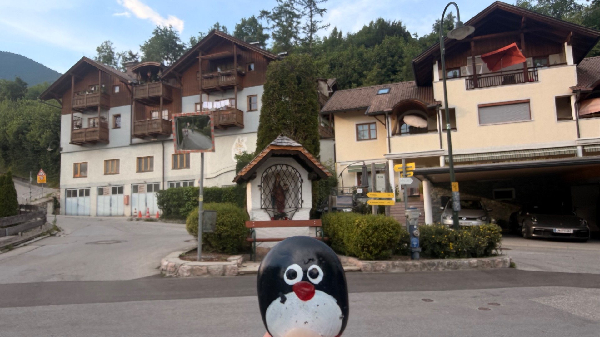 Hand-painted penguin stone #1267 hidden at Small Chapel with bench, St. Wolfgang im Salzkammergut, Austria (photo 1 of 5)