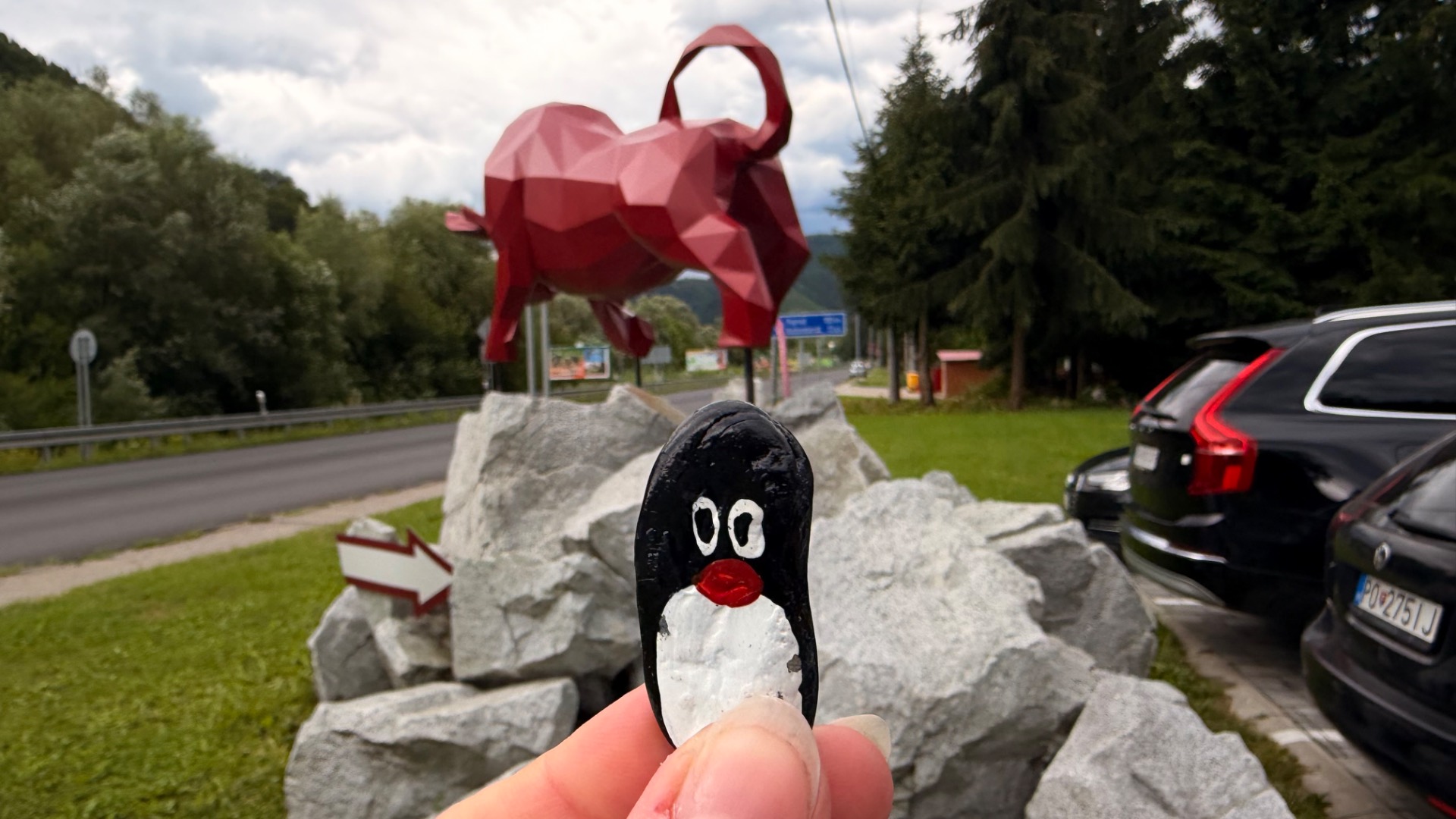 Hand-painted penguin stone #1269 hidden at FatraBeef, Lubochna, Slovakia (photo 1 of 5)
