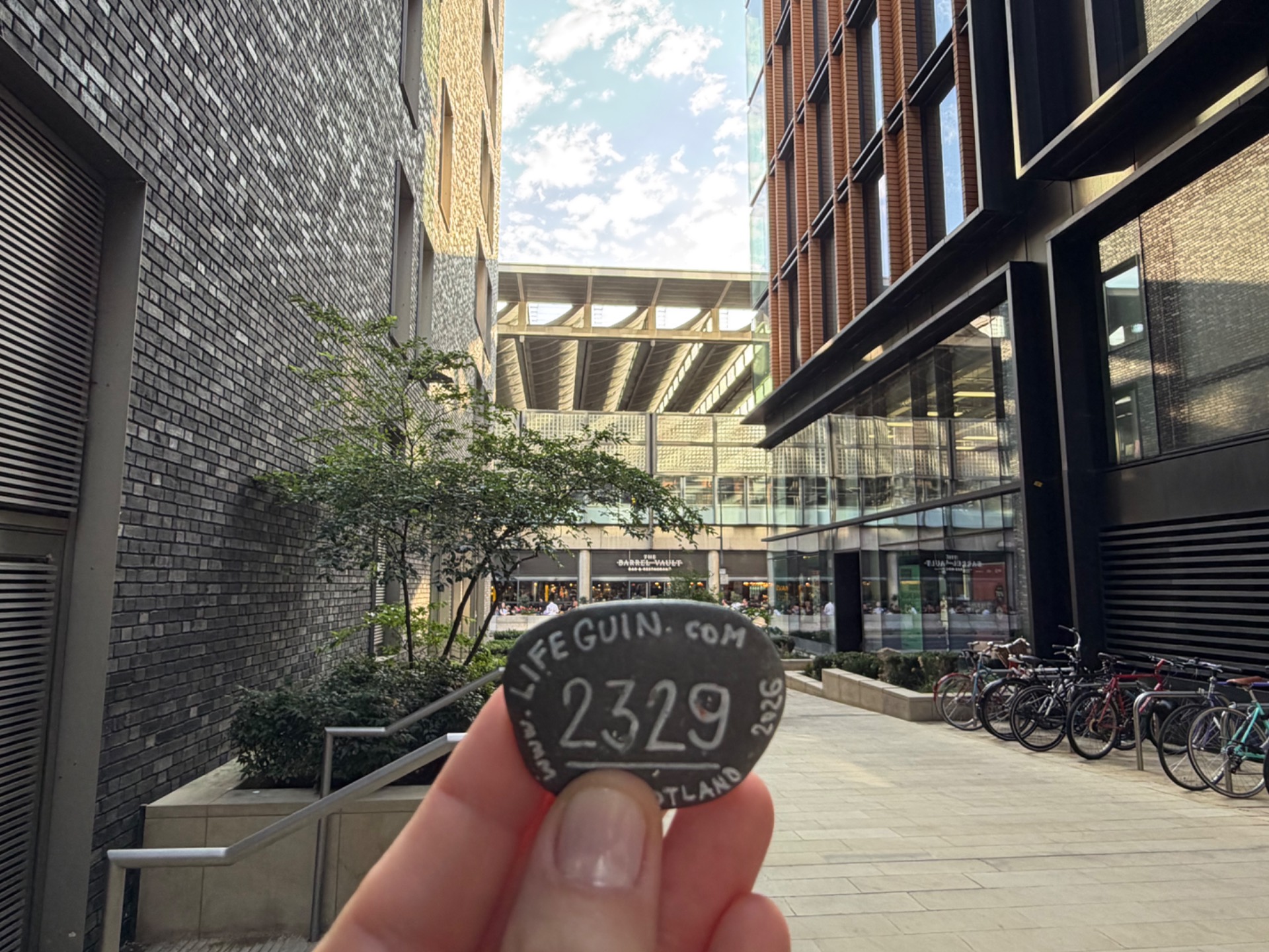 Hand-painted penguin stone #2329 hidden at Google London - Pancras Square, London, United Kingdom (photo 1 of 5)