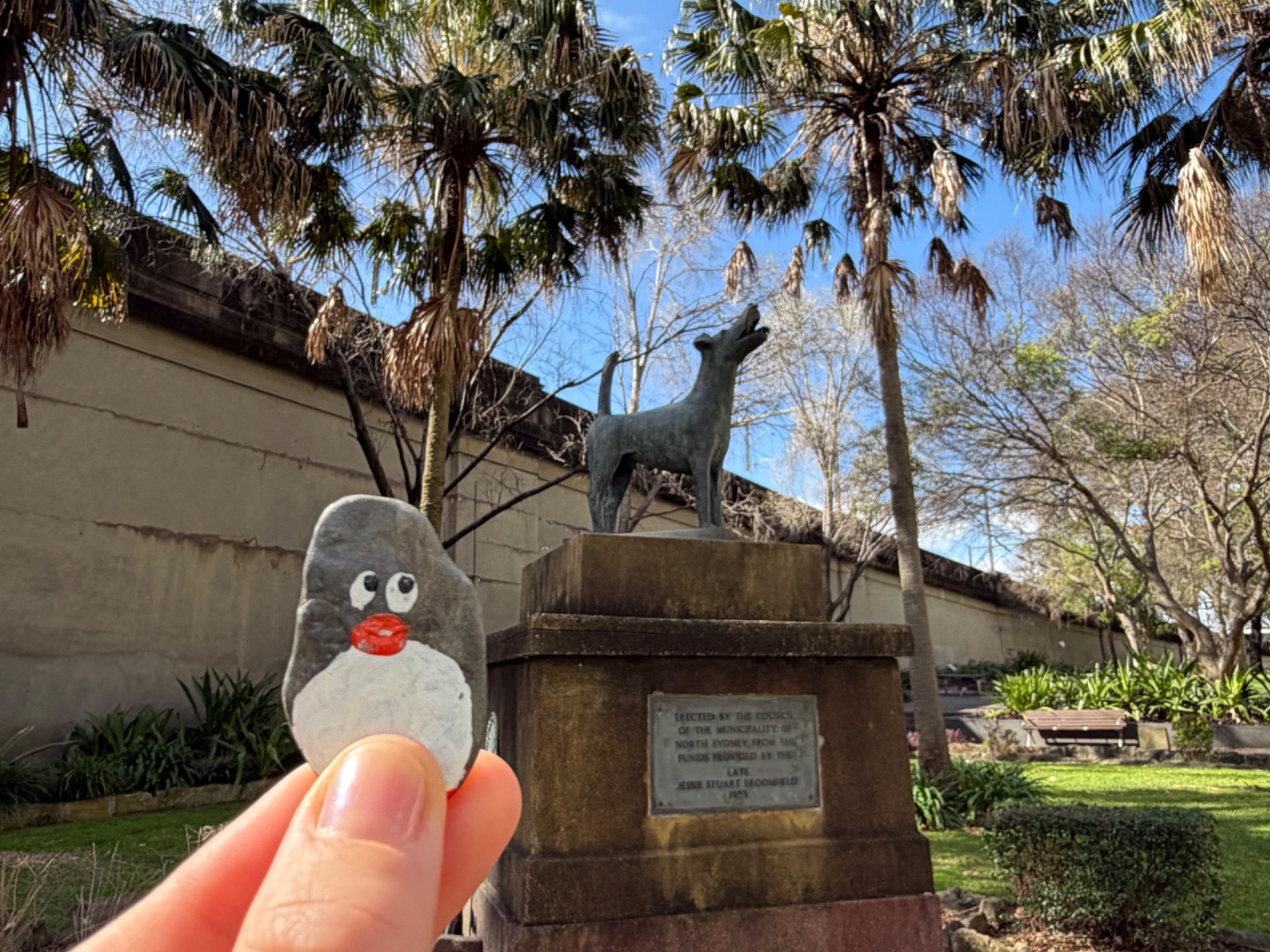 Hand-painted penguin stone #2346 hidden at Jessie Stuart Broomfield Monument, Sydney, Australia (photo 1 of 4)