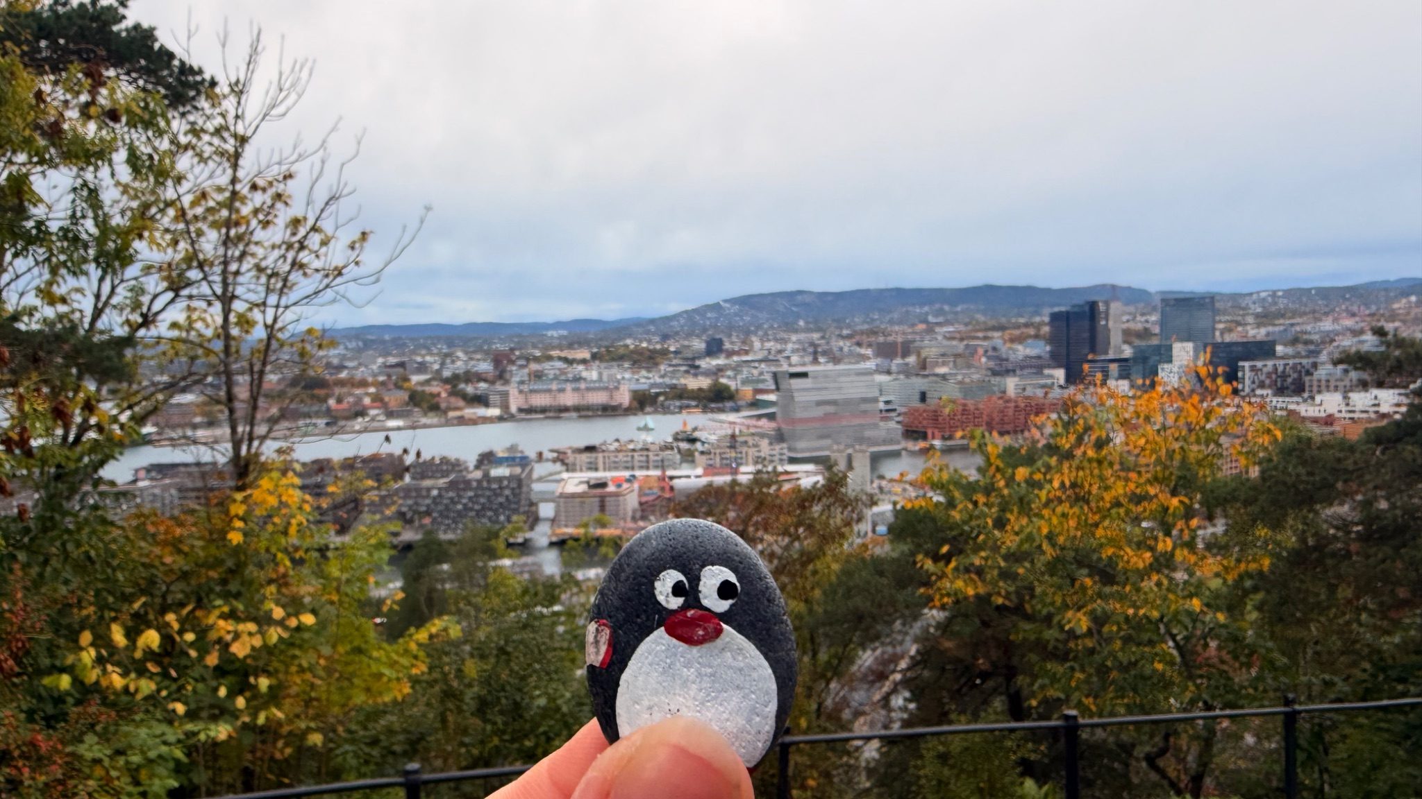 Hand-painted penguin stone #1388 hidden at Ekeberg Scenic Viewpoint, Oslo, Norway (photo 1 of 5)