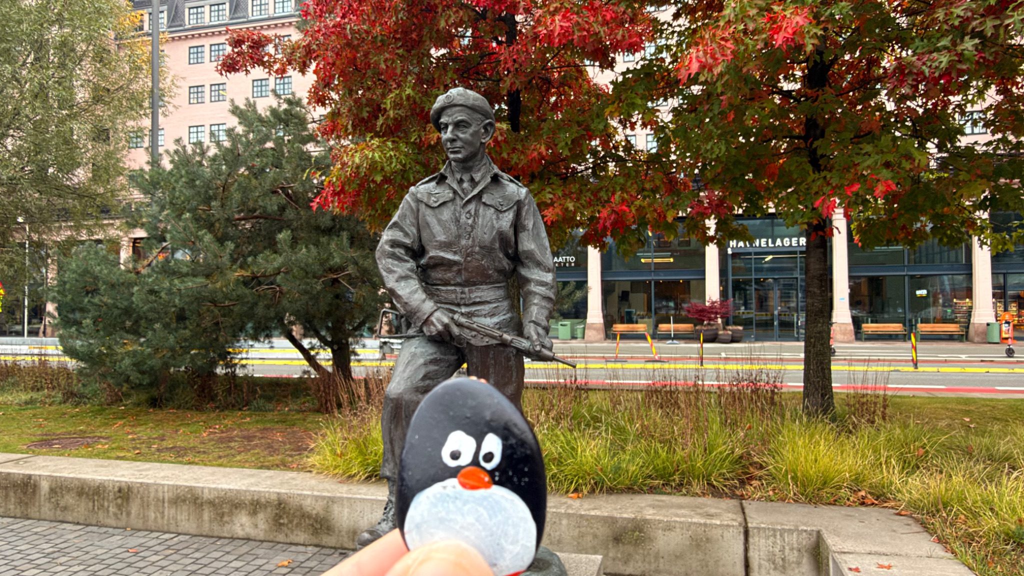 Hand-painted penguin stone #1474 hidden at Max Manus Statue, Oslo, Norway (photo 1 of 5)