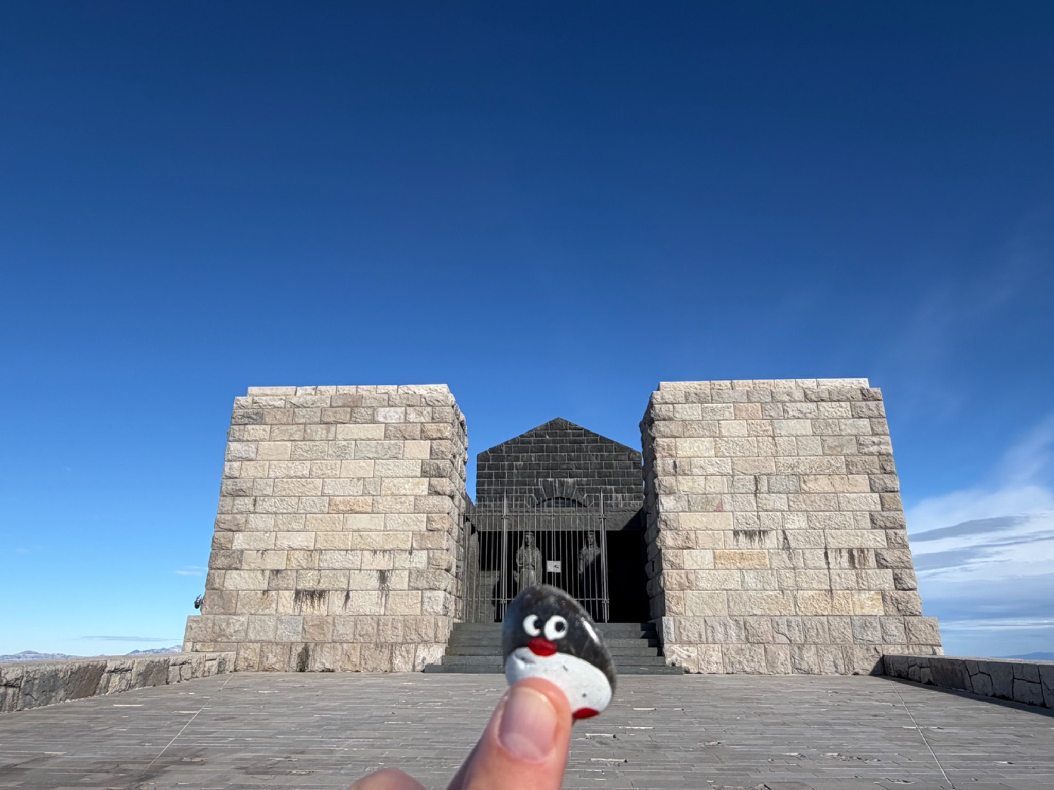 Hand-painted penguin stone #2194 hidden at Mausoleum of Petar II Petrovic Njegos, Cetinje, Montenegro (photo 1 of 5)