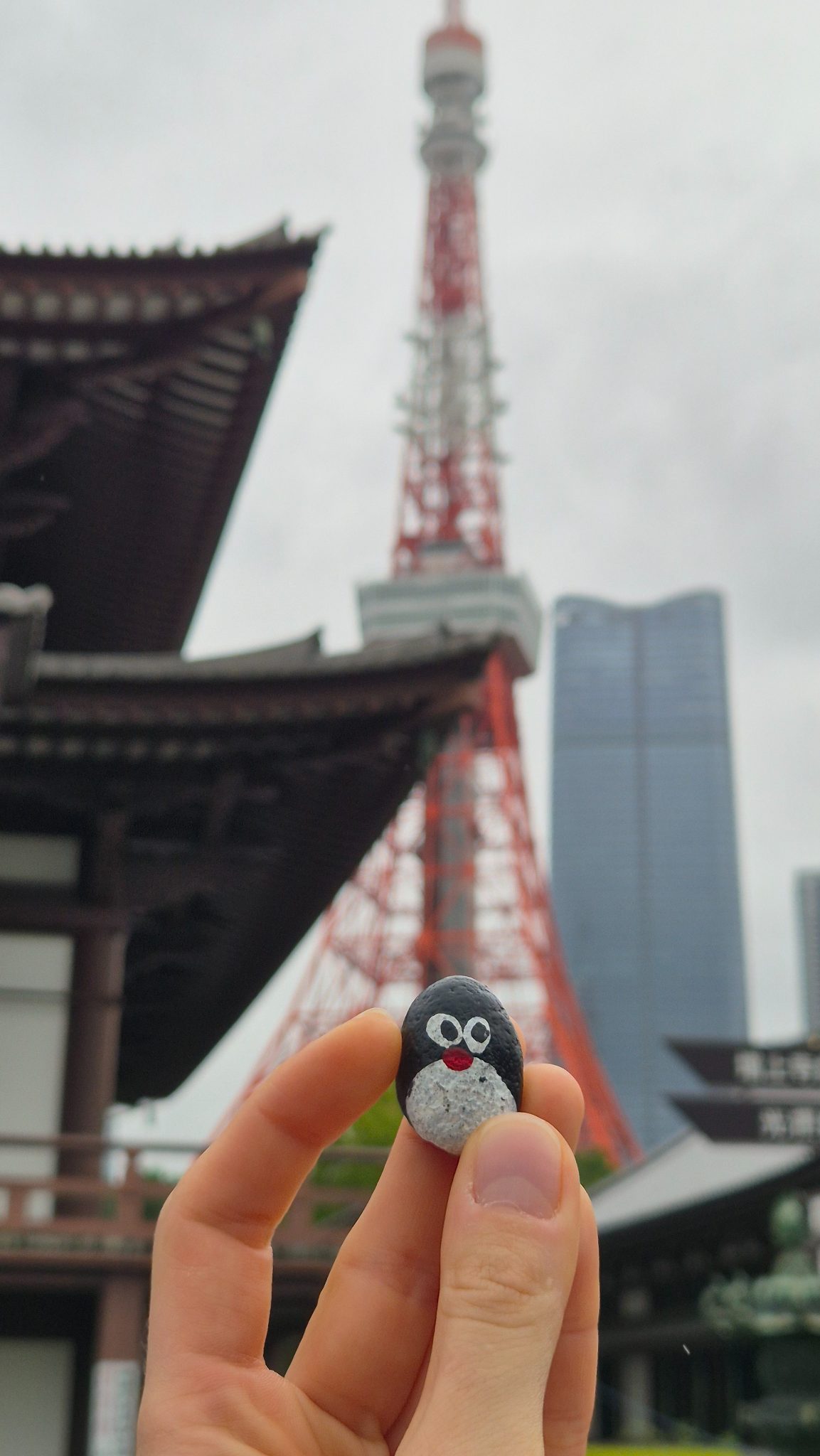 Hand-painted penguin stone #881 hidden at Zojo-ji Temple, Tokyo, Japan (photo 1 of 4)